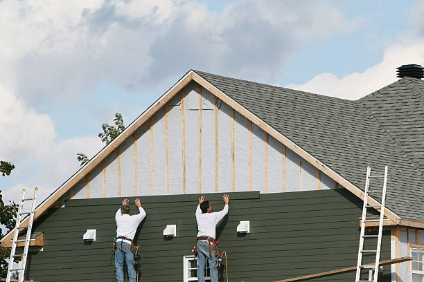 Professional Emergency Siding Repair technician working in Toronto, OH